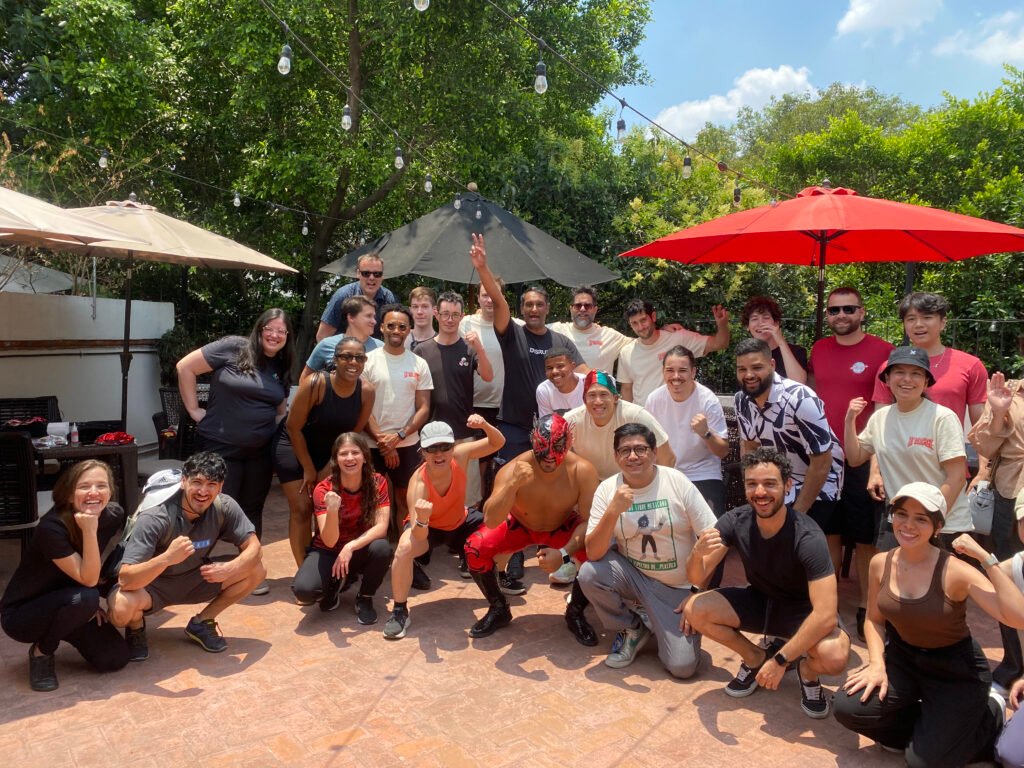 A group of guests with Lucha Mexico Experience gathered outdoors in Mexico City